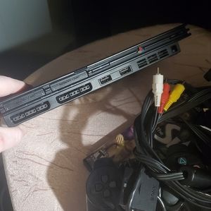 PS2 with games, wires, controllers and more